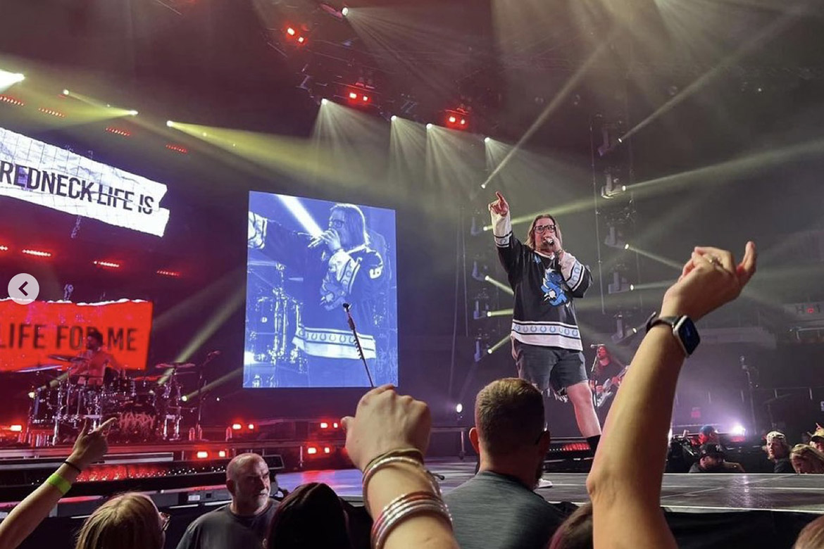 Hardy, Middle Tennessee State University recording industry alumnus and country music artist, wears a custom-made MTSU ice hockey jersey adorned with “Hardy” across the back at one of his shows in fall 2023. (Photo courtesy of MTSU Hockey’s Instagram)