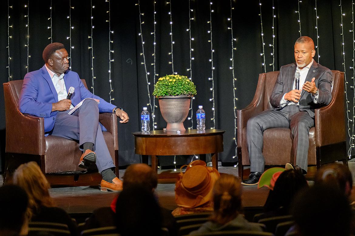 Motivational speaker, consultant and author Isaac Ford Jr., right, shares insights with the audience as guest speaker for “A Conversation on Resilience and Perseverance” hosted Oct. 9 by Middle Tennessee State University Office of Intercultural and Diversity Affairs in the Keathley University Theater on campus in Murfreesboro, Tenn. At left is MTSU student Ben Thompson, who served as moderator. (MTSU photo by Cat Curtis Murphy)