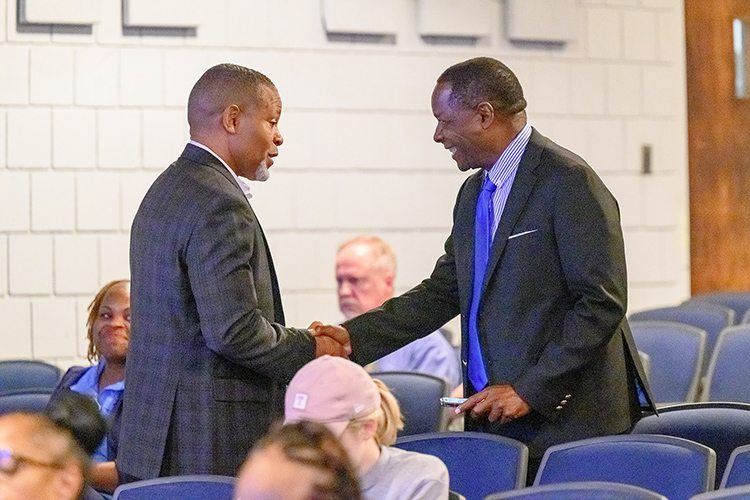 Middle Tennessee State University President Sidney A. McPhee, right, greets motivational speaker, consultant and author Isaac Ford Jr., left, who presented “A Conversation on Resilience and Perseverance” hosted Oct. 9 by the Office of Intercultural and Diversity Affairs in the Keathley University Theater on campus in Murfreesboro, Tenn. (MTSU photo by Cat Curtis Murphy)