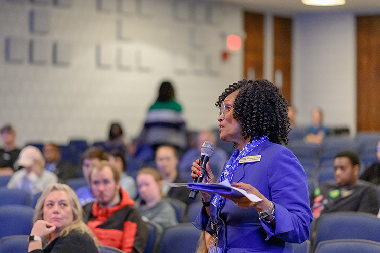 Violet Cox-Wingo, a lecturer in the Department of Social Work at Middle Tennessee State University in Murfreesboro, Tenn., asks a question during “A Conversation on Resilience and Perseverance” featuring motivational speaker, consultant and author Isaac Ford Jr. held Oct. 9 in the Keathley University Theater. (MTSU photo by Cat Curtis Murphy)