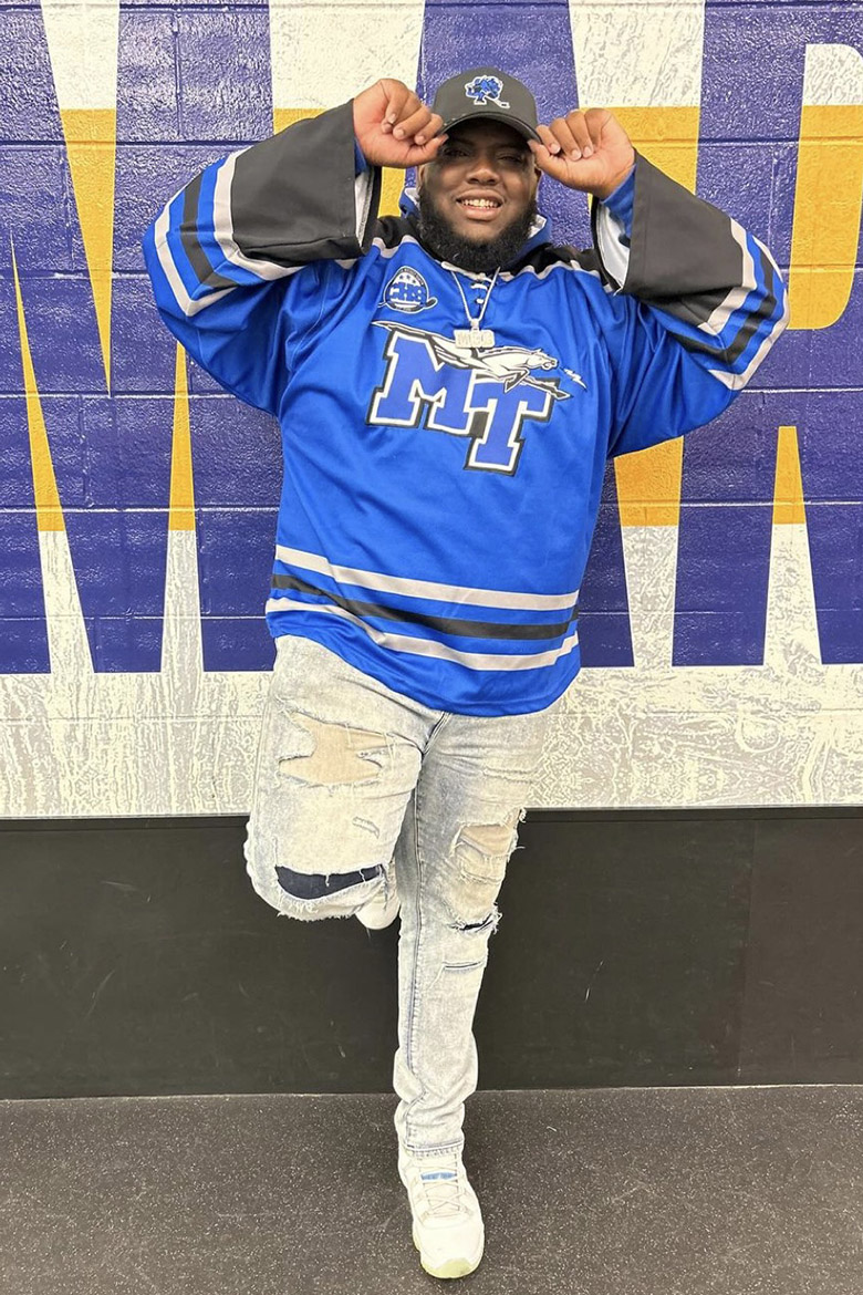 Rapper M.C. D from Nashville Tenn., wears a Middle Tennessee State University ice hockey jersey and hat for the first home game of the season on Sept. 27 against the University of Alabama-Birmingham at the Ford Ice Center in Antioch, Tenn. The Nashville rapper dropped the puck for the game and has established a connection with the team, which plays one of his songs after scoring goals. (Photo courtesy of M.C. D’s Instagram)