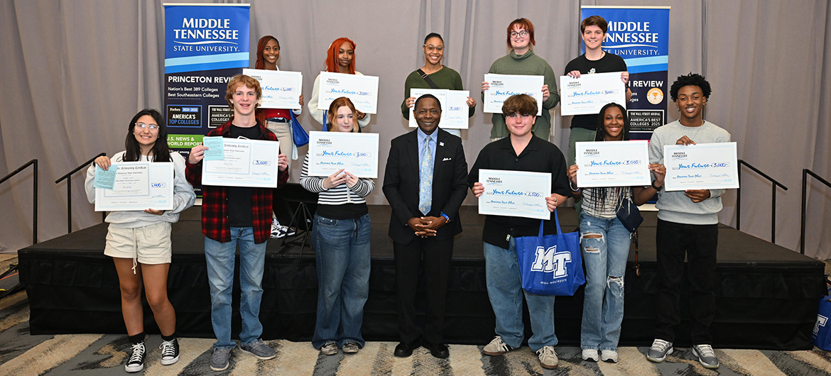 Eleven of 13 scholarship recipients from the Chattanooga, Tenn., area are shown with Middle Tennessee State University President Sidney A. McPhee, front row center, on Tuesday, Oct. 22, during the MTSU True Blue Tour visit at The Chattanoogan Hotel. (MTSU photo by James Cessna)