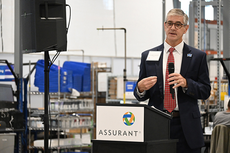 Greg Van Patten, dean of Middle Tennessee State University’s College of Basic and Applied Sciences, thanks Assurant Inc. for its two-year $100,000 grant awarded to the university in support of its mechatronics engineering program and a new lab in the Applied Engineering Building set to open next fall on campus. Van Patten’s remarks came at Assurant’s Oct. 10 grand opening of its Mt. Juliet, Tenn. (MTSU photo by Jimmy Hart)