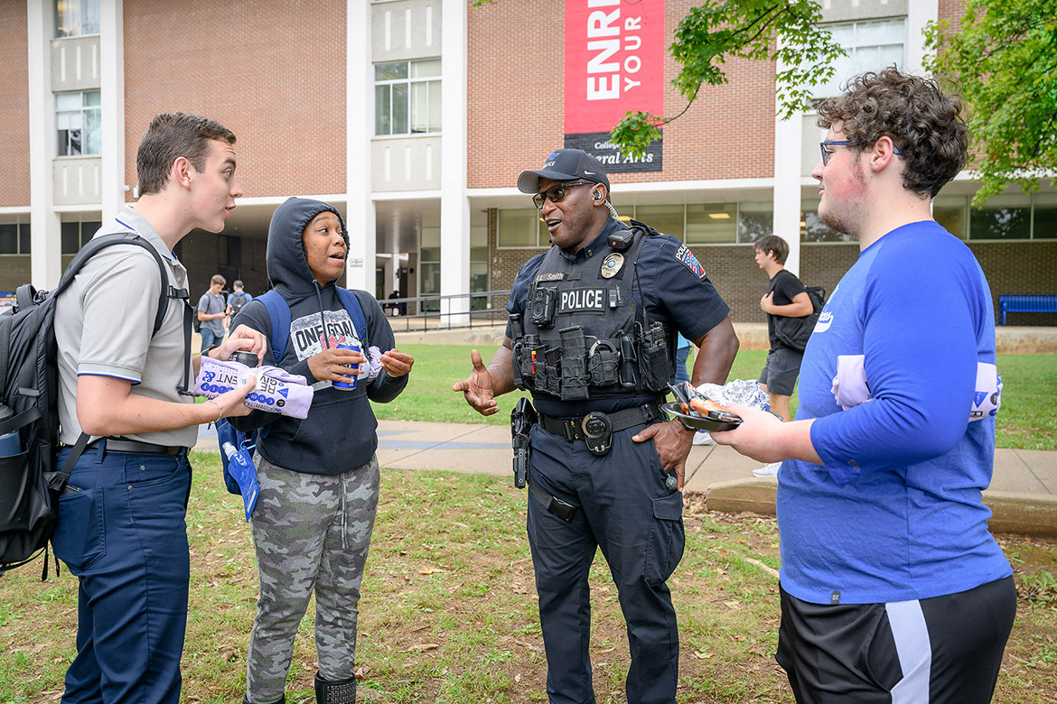 Middle Tennessee State University Police Department Lt. Demetrius Smith talks with students at the annual International Day of Nonviolence event to reaffirm the True Blue Pledge of committing to reason and not violence as well as celebrating late peace advocate Mahatma Gandhi’s birthday on Wednesday Oct. 2, in Walnut Grove in Murfreesboro, Tenn. (MTSU photo by J. Intintoli)