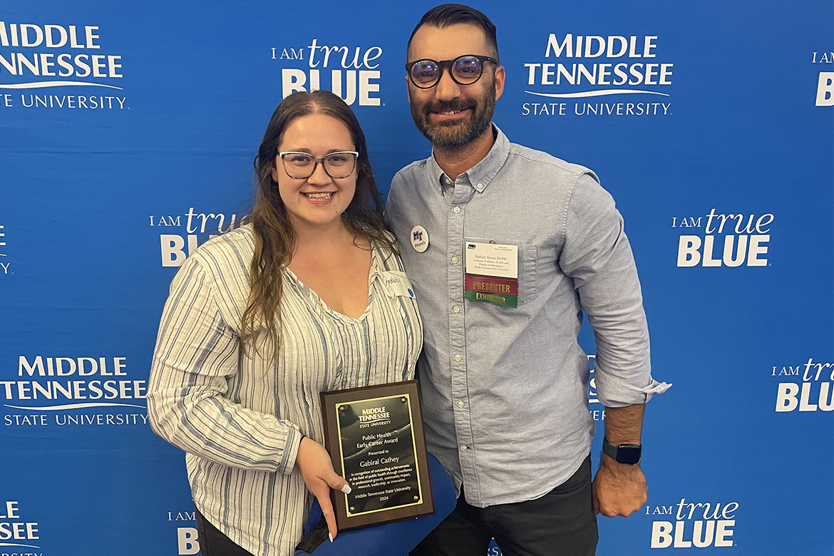 Kahler Stone, associate professor of public health at Middle Tennessee State University in Murfreesboro, Tenn., right, stands with MTSU alumna Gabiral Cathey, who was awarded the MTSU Public Health Early Career Award at the second annual “PHamily Dinner Reception” and awards ceremony held Oct. 9 at the MT Center on campus. Fellow alumna Claire Robinson (not pictured) also received the honor but was unable to attend. (Submitted photo)