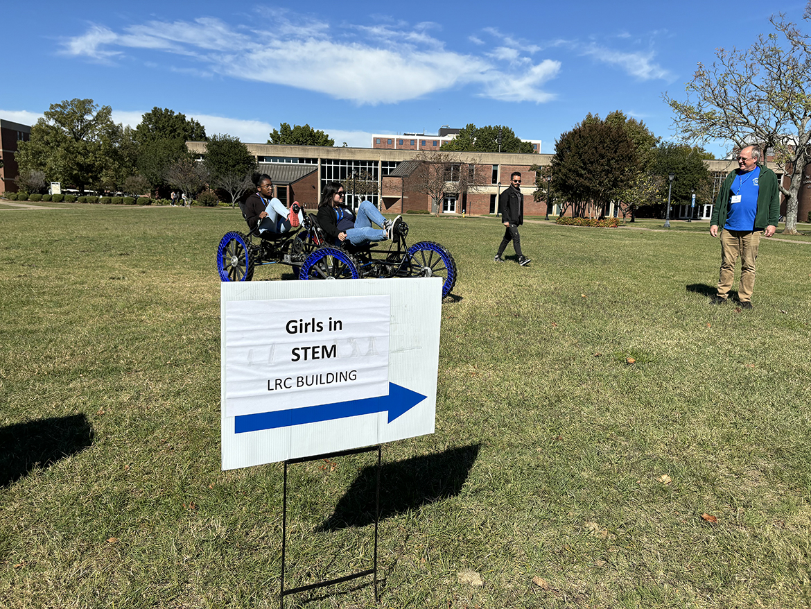 Abigail Mazey, right, a student at Central Magnet School in Murfreesboro, Tenn., and Jaishawna Akin, a Siegel High School student, take a Department of Engineering Technology Experimental Vehicles Program lunar rover for a ride during the 28th annual Tennessee Girls in STEM Conference at Middle Tennessee State University in Murfreesboro Saturday, Oct. 19. Girls learned about science, technology, engineering and math career possibilities and participated in hands-on activities during the event. (MTSU photo by Randy Weiler)