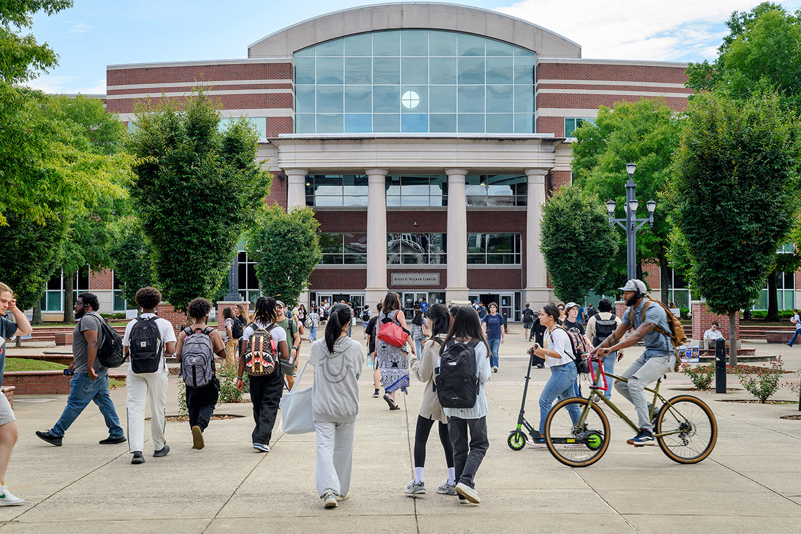 Middle Tennessee State University students make their way to class through the Quad area in front of the James E. Walker Library in mid-September. (MTSU photo J. Intintoli)