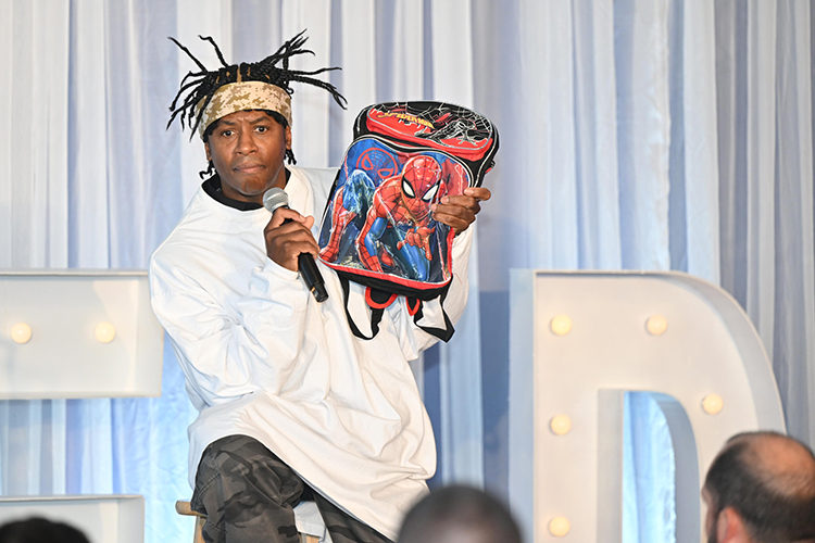 Internationally known educator, author and keynote speaker Adolph “Doc” Brown makes a point using a Spiderman backpack during the Middle Tennessee State University’s 2024 Leadership Summit hosted Oct. 25 by the Jones College of Business at the Stones River Country Club in Murfreesboro, Tenn. (MTSU photo by James Cessna)