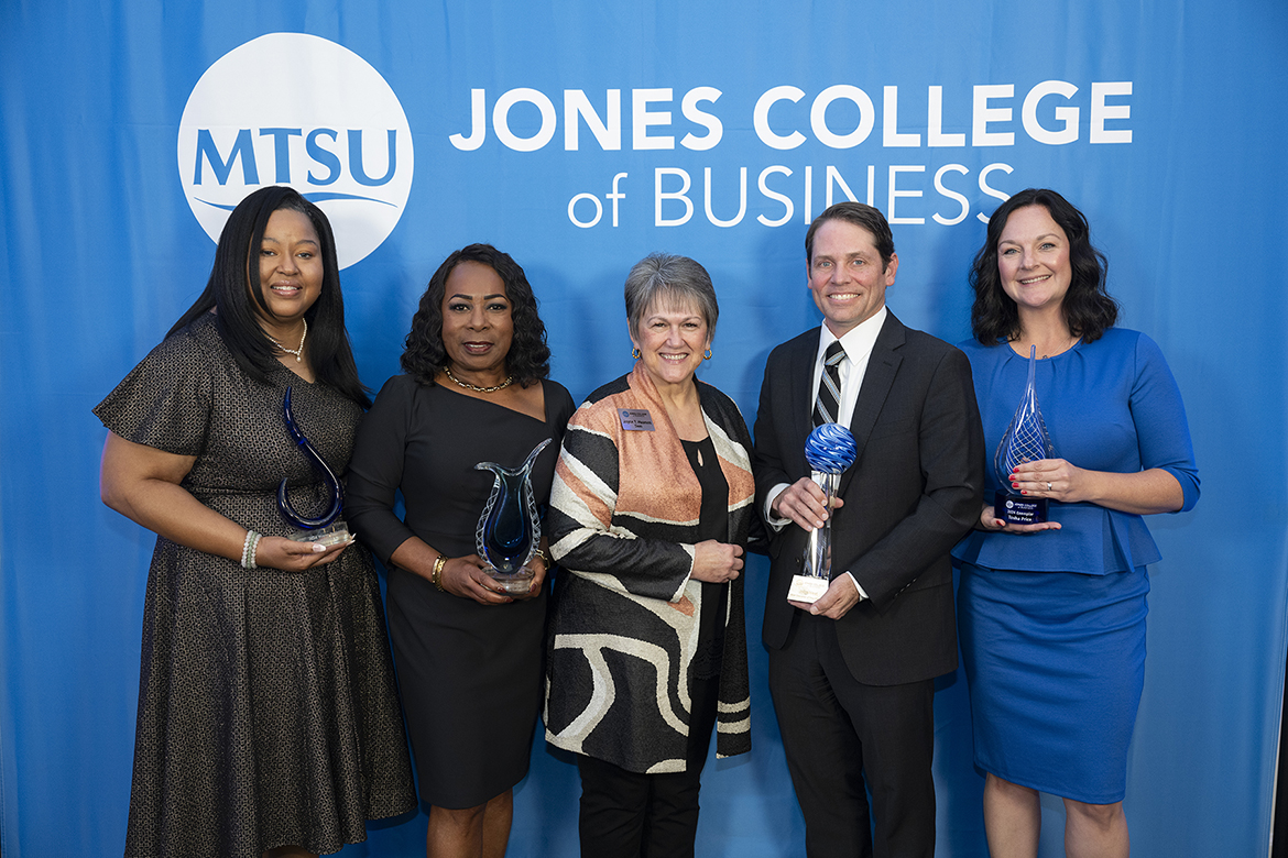 Joyce Heames, center, dean of Middle Tennessee State University’s Jennings A. Jones College of Business, stands with recipients of this year’s college leadership awards during a special reception and awards ceremony Oct. 24 at the Stones River Country Club in Murfreesboro, Tenn. Pictured, from left, are Young Professional of the Year Award recipient Derria Ford; Joe M. Rodgers Spirit of America Award recipient Victoria Eady Butler; Heames; Jennings A. Jones Champion of Free Enterprise Award recipient John West; and Jones College Exemplar Award recipient Tosha Price. (MTSU photo by James Cessna)