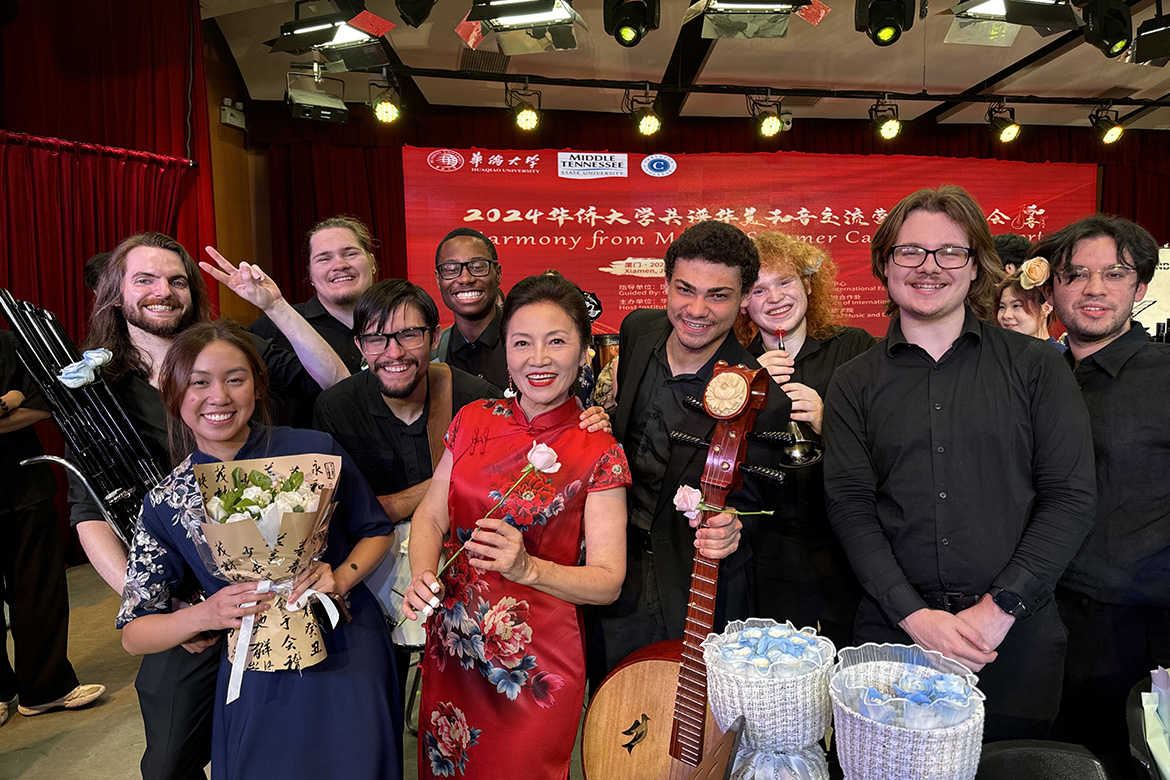 The Middle Tennessee State University Chinese Music Ensemble members, front row, from left, Christina Vongsiharath, Emory Gaskill, music professor and director Mei Han, Jarran Armstrong and Jakob Young, and back row, from left, Alex Strader, Henry Wright, Shane Spurgeon, Jacob Capistrant and Alex Moreno pose following a concert in Xiamen, China. (Submitted photo)