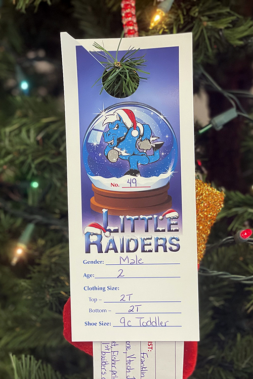 Little Raiders ornaments like this one will be hanging on three trees across campus supporting the Little Raiders gift-giving campaign. Secret Santas can pick an ornament to “adopt” a local child’s Christmas wish list. (MTSU file photo by DeAnn Hays)