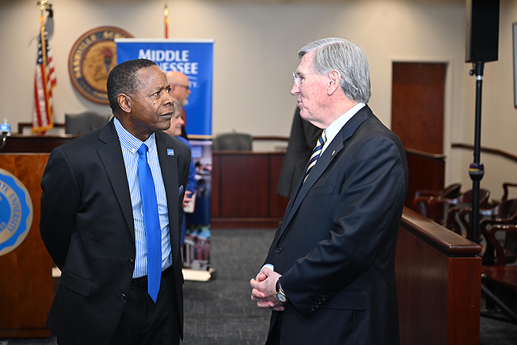 Middle Tennessee State University President Sidney A. McPhee, left, and Nashville School of Law Dean William C. Koch Jr. chat before the institutions’ joint announcement Tuesday, Nov. 19, on the NSL campus in Nashville, Tenn., outlining a partnership in which a new MTSU master’s degree in legal studies will be taught in part by NSL faculty. (MTSU photo by James Cessna)