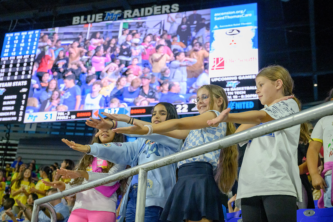 Four girls from a Rutherford County elementary school dance to the “Macarena” song during halftime during the game between the Middle Tennessee State University Blue Raider men’s basketball team and Oglethorpe University Petrels in Murphy Center on the MTSU campus in Murfreesboro, Tenn. The Blue Raiders prevailed, 97-51, in the annual Rutherford County Schools’ Education Day game. (MTSU photo by J. Intintoli) Students from all RCS elementary schools and the RCS Transition Academy were treated to a men's basketball game to expose them to the university campus.