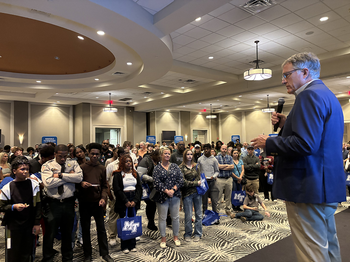 A large crowd of prospective students and their family members listen as Middle Tennessee State University Provost Mark Byrnes discusses academic programs, caring faculty and staff and other benefits when considering MTSU as a college choice Oct. 28 during the annual True Blue Tour recruiting event at Esplande Memphis in Cordova, Tenn. (MTSU photo by Randy Weiler)