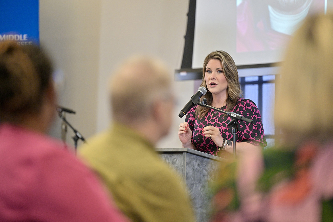 Master of ceremony Meaghan Thomas, WBRC-TV News 6's first alert meteorologist, briefly speaks about her nonprofit, The Heart of Hearing, at Middle Tennessee State University’s National Disability Employment Awareness Month conference on Oct. 29 in the Sam H. Ingram Building on campus in Murfreesboro, Tenn. Thomas’ organization raises funds for those who cannot afford hearing aids. (MTSU photo by J. Intintoli)