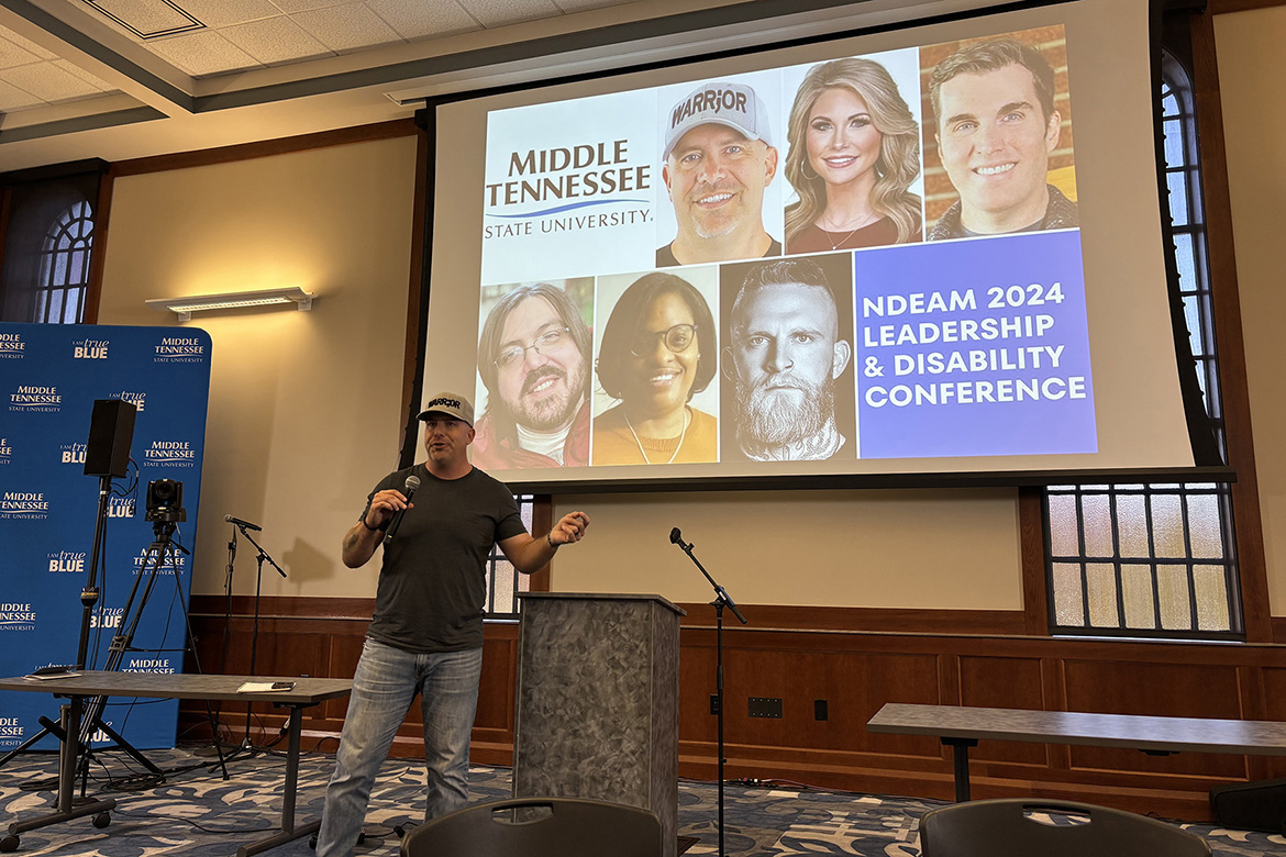 Eric Zink, one of the largest mental health and addiction advocate educators on social media, shares his story and reminds the audience the importance of talking about mental health at the Oct. 29 Middle Tennessee State University National Disability Employment Awareness Month conference in the Sam H. Ingram Building on campus in Murfreesboro, Tenn. (MTSU photo by Maddy Williams)