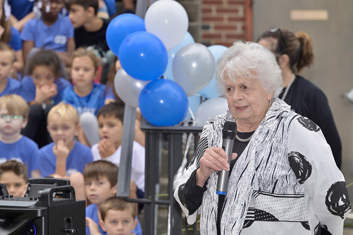 Liz Bennett, one of the “lollygaggers,” a long-term friend group who travels with Whorley Bradley each summer, and who taught next door to the former first grade teacher, gives remarks at the event to commemorate former principal and first grade teacher Liz Whorley Bradley at Homer Pittard Campus School in Murfreesboro Tenn. Middle Tennessee State University partnered with Friends of Campus School and Rutherford County Schools to plan and implement the street signs. (MTSU photo by Andy Heidt)