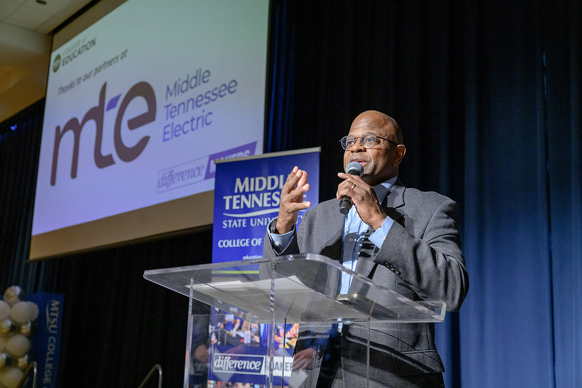 Robert White, vice president of communications and member services for Middle Tennessee Electric, speaks about the partnership with Middle Tennessee State University’s College of Education at a celebration of students who completed their semester-long residencies. MTE awarded the college $40,000 to outfit future teacher classrooms each semester for the next four years, with two students presented $2,500 Spark Awards to decorate their classrooms during the Dec. 12 seminar in the James Union Building on campus in Murfreesboro, Tenn. (MTSU photo by J. Intintoli)