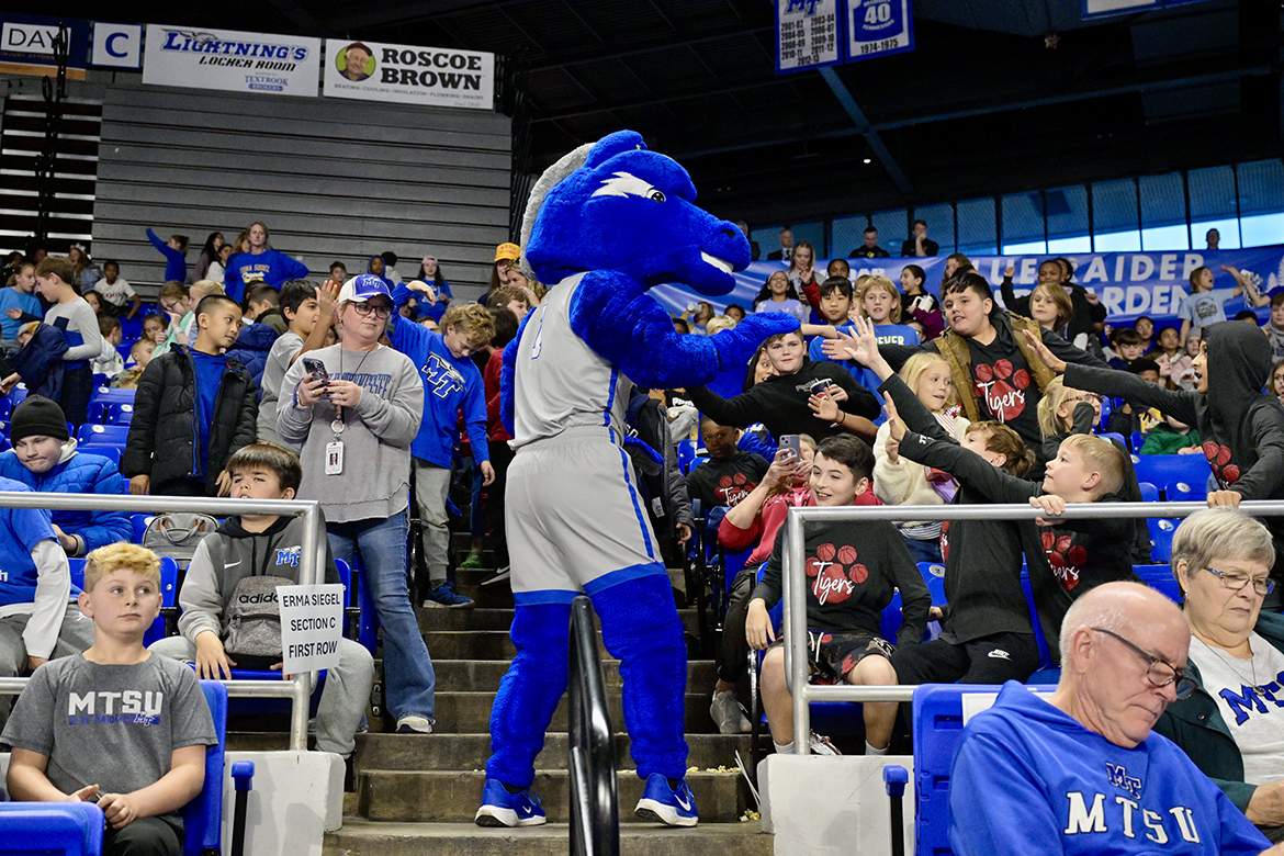 Blue Raider mascot Lightning gets youngsters from one of Murfreesboro City elementary schools fired up during the annual Education Day game Wednesday, Dec. 4, in Murphy Center on the Middle Tennessee State University campus in Murfreesboro, Tenn. (MTSU photo by Andy Heidt)