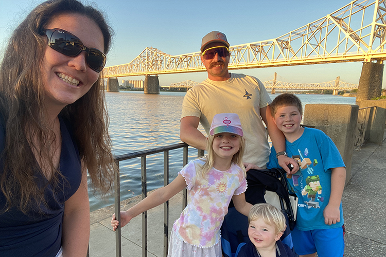 In this undated photo, Heather Zimmerman, left, executive director of the state’s fightfighting commission, is pictured along the Mississippi River with her family that includes husband Luke, daughter Elizabeth, bottom center, and sons Gage, right, and Leif. Zimmerman will soon graduate from Middle Tennessee State University with her bachelor’s degree after returning to the classroom to further study public safety. (Submitted photo)