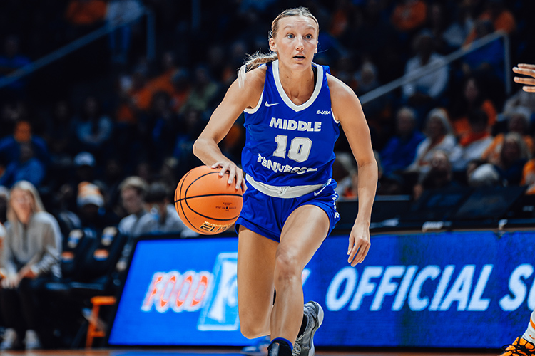 Middle Tennessee State University’s Jalynn Gregory, a senior guard on the Blue Raider women’s basketball team, directs the offense in this undated photo from a game inside Murphy Center in Murfreesboro, Tenn. (Courtesy of MTSU Athletics)