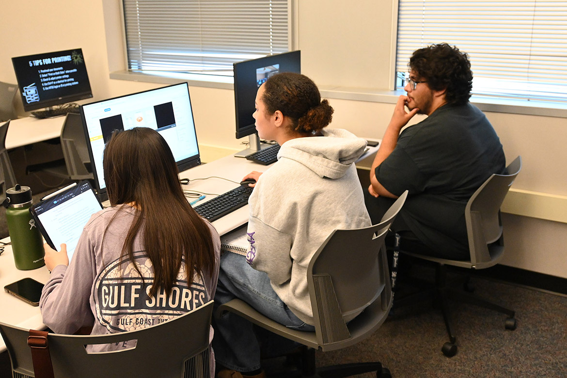 Middle Tennessee State University students work on their group study using the iMotion Online for Education artificial intelligence software, or AI, in the neuromarketing class of Gaia Rancati, assistant professor of marketing, in the Business and Aerospace Building on campus in Murfreesboro, Tenn. (MTSU photo by Maddy Williams)