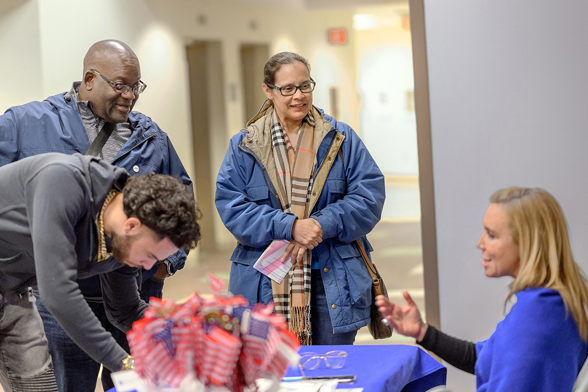 New and returning Middle Tennessee State University student veterans register and listen as Hilary Miller, right, the director of the Charlie and Hazel Daniels Veterans and Military Family Center, provides information during a spring semester Newcomers Briefing in January 2024 at the Miller Education Center on Bell Street in Murfreesboro, Tenn. The Daniels Center serves as a one-stop shop for the military connected student population on campus. (MTSU file photo by Cat Curtis Murphy)