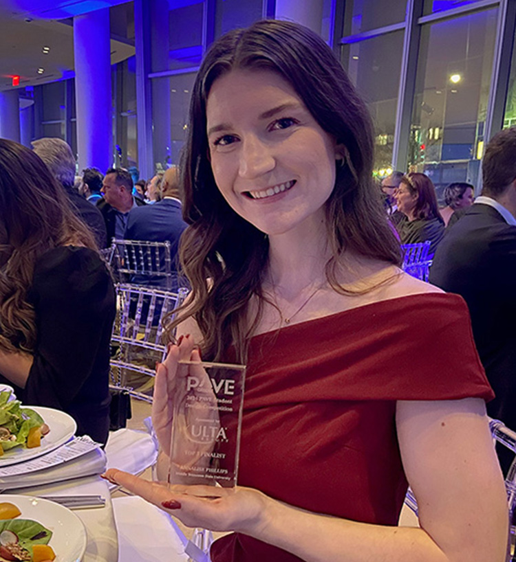 Interior architecture major Annalise Phillips, a Nolensville, Tenn., resident and senior at Middle Tennessee State University in Murfreesboro, holds her award from the 29th annual Planning and Visual Educational Partnership, or PAVE, International Student Design Competition Gala held in New York City in December 2024. Phillips was one of three finalists for the prestigious PAVE Global competition that drew entries from 107 educational institutions across 28 countries, representing a wide variety of disciplines like interior design, retail planning, graphic design and industrial design. (Submitted photo)