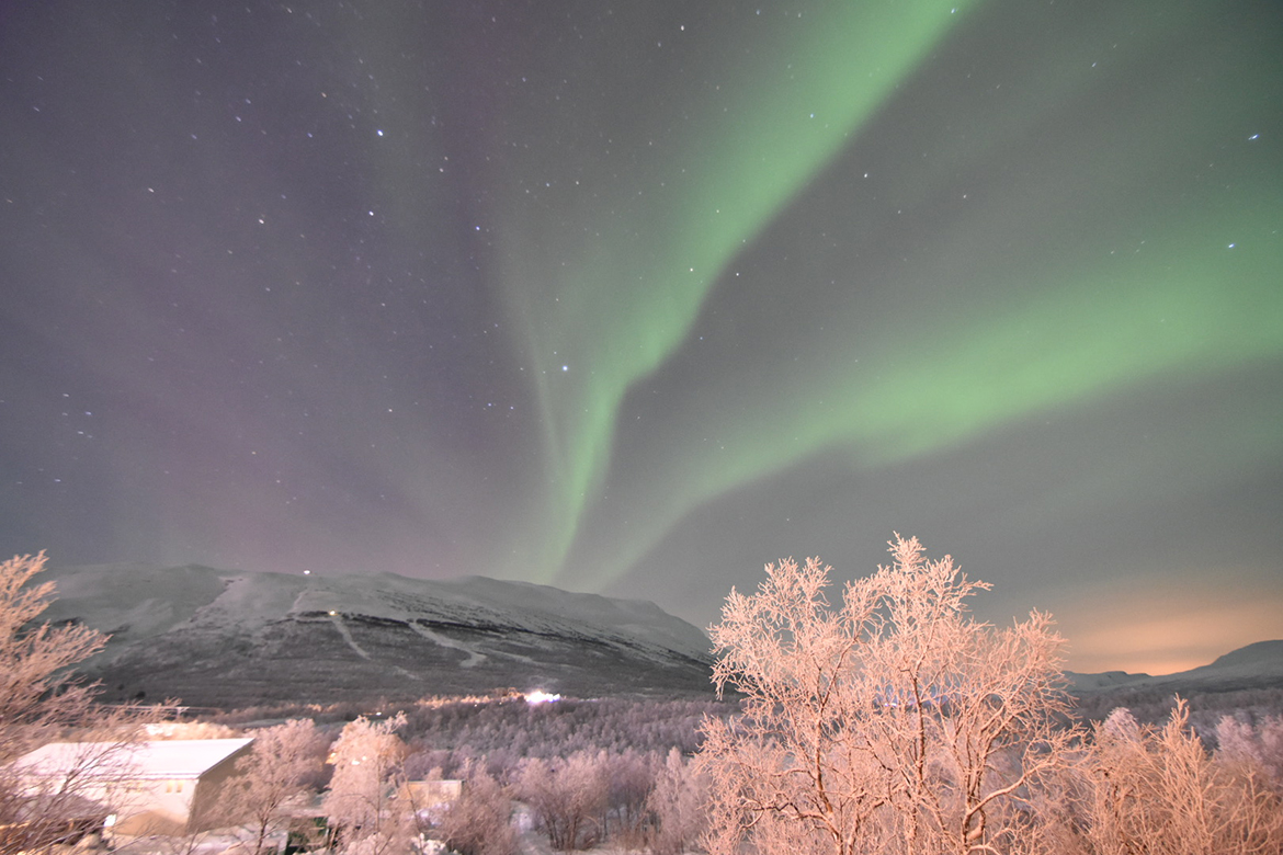 On a starry night in mountains at the Arctic Circle in Sweden, the aurora brings a green glow and other colors to the sky. During the December and January winter break for faculty and students, Middle Tennessee State University Physics and Astronomy professor John Wallin and his wife, Katharine Bond, visited the area and he will discuss the trip during the Star Party starting at 6:30 p.m. Friday, Feb. 7, in Wiser-Patten Science Hall Room 102. (MTSU photo by John Wallin)