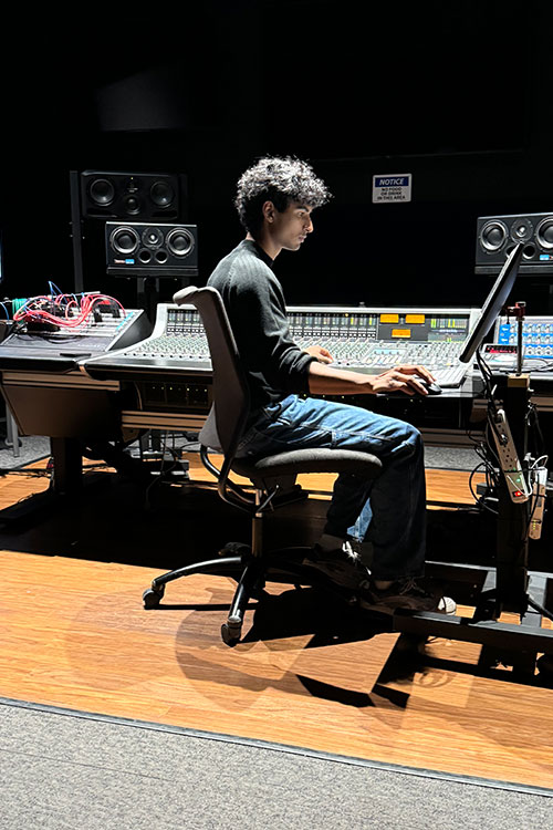 Mahi Parsai, an international student from India in the Department of Recording Industry audio production program at Middle Tennessee State University in Murfreesboro, Tenn., recorded his first song in Studio D in the College of Media and Entertainment with the locally based band Stones River Revival. (Photo submitted)