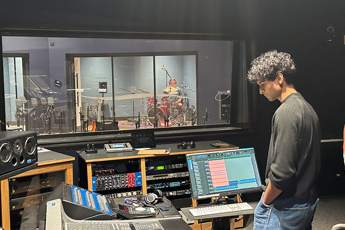 Middle Tennessee State University Audio Production student Mahi Parsai, seen here in this undated photo, works in Studio D inside the College of Media and Entertainment Building where he recorded his first song with the Murfreesboro, Tenn.-based band Stones River Revival titled “Moving On.” (Photo submitted)