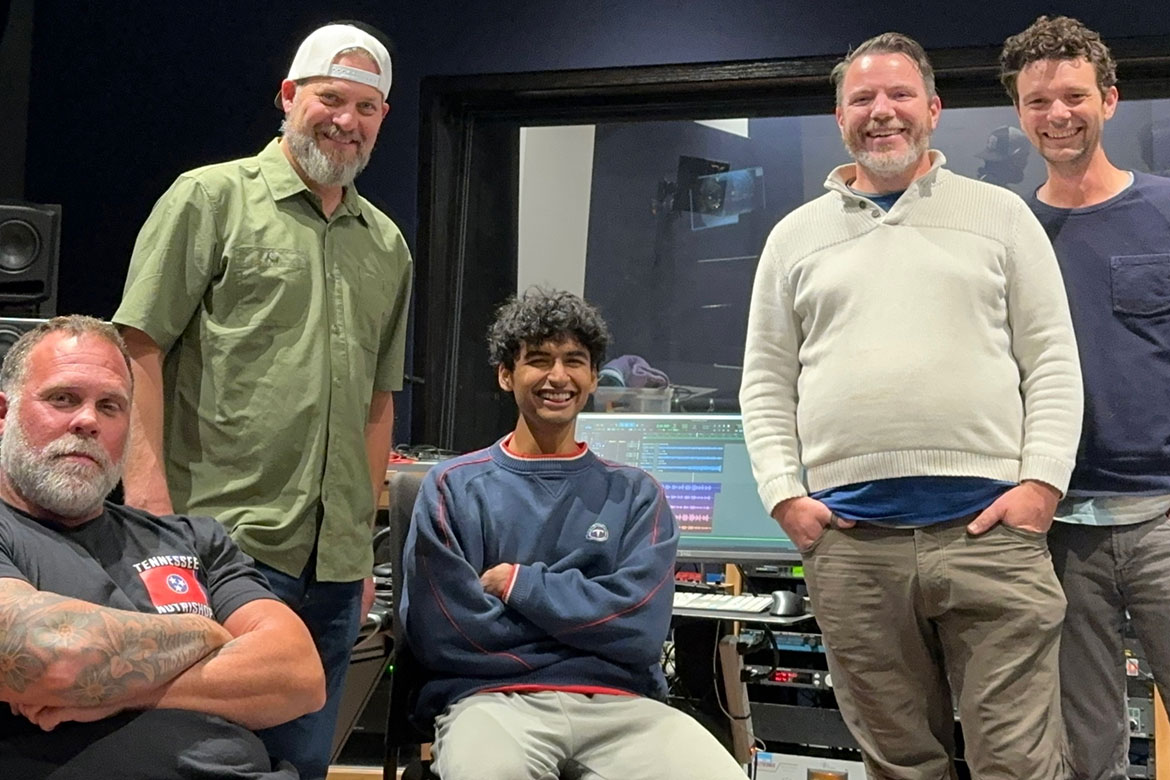 International and Audio Production student Mahi Parsai, center, recorded his first song with Stones River Revival, a self-described “dad band,” inside Studio D in Middle Tennessee State University’s College of Media and Entertainment recently after Parsai met the band. Pictured, from left, are Marty Martin, Chuck Harvill, Parsai, Nathan Brown and Rob Janson, at MTSU’s homecoming football game against Duke University on campus in Murfreesboro, Tenn. (Photo submitted)