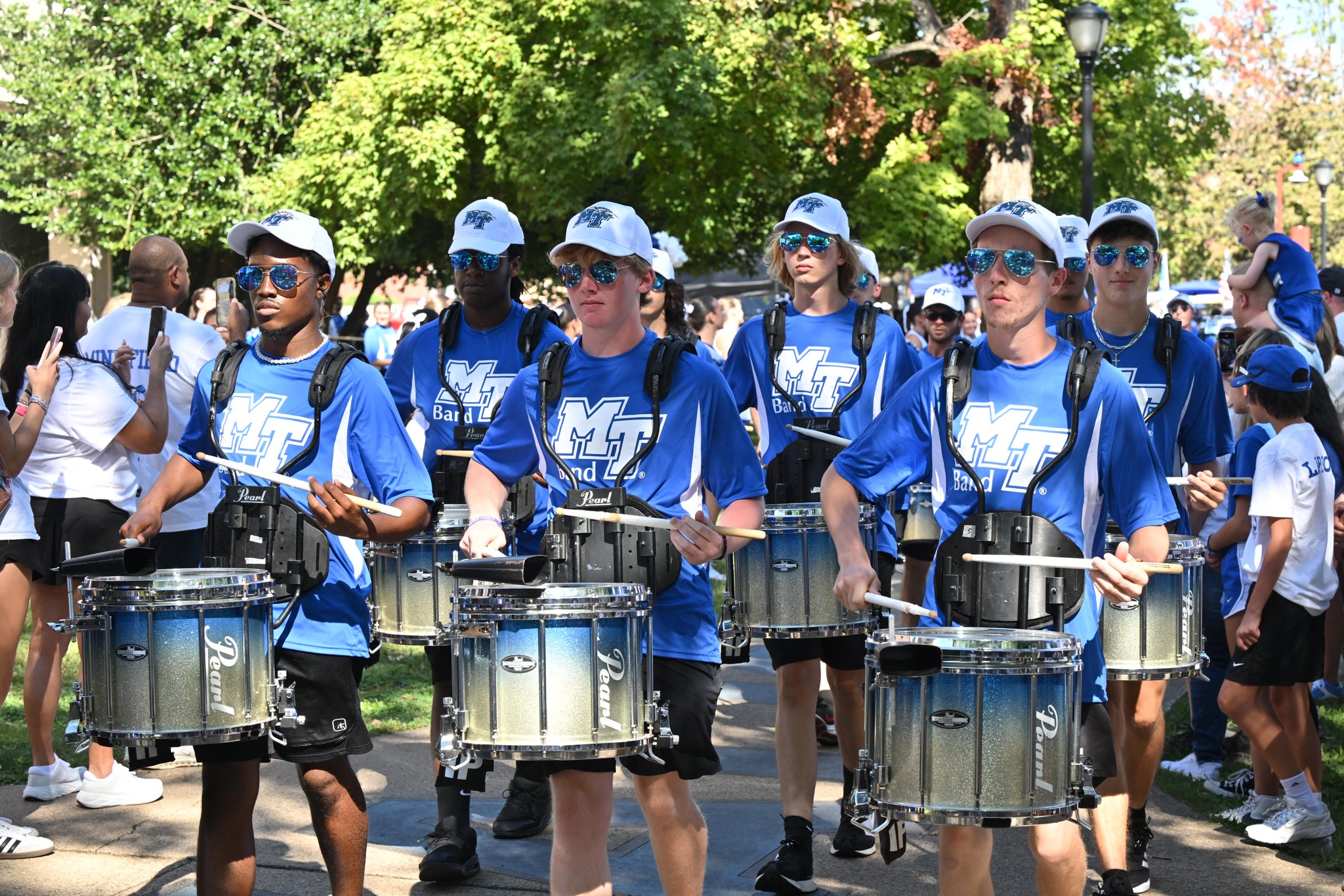 In this undated photo, Middle Tennessee State University's Band of Blue performs in Walnut Grove ahead of a home game inside Floyd Stadium in Murfreesboro, Tenn. (Photo Andy Heidt)
