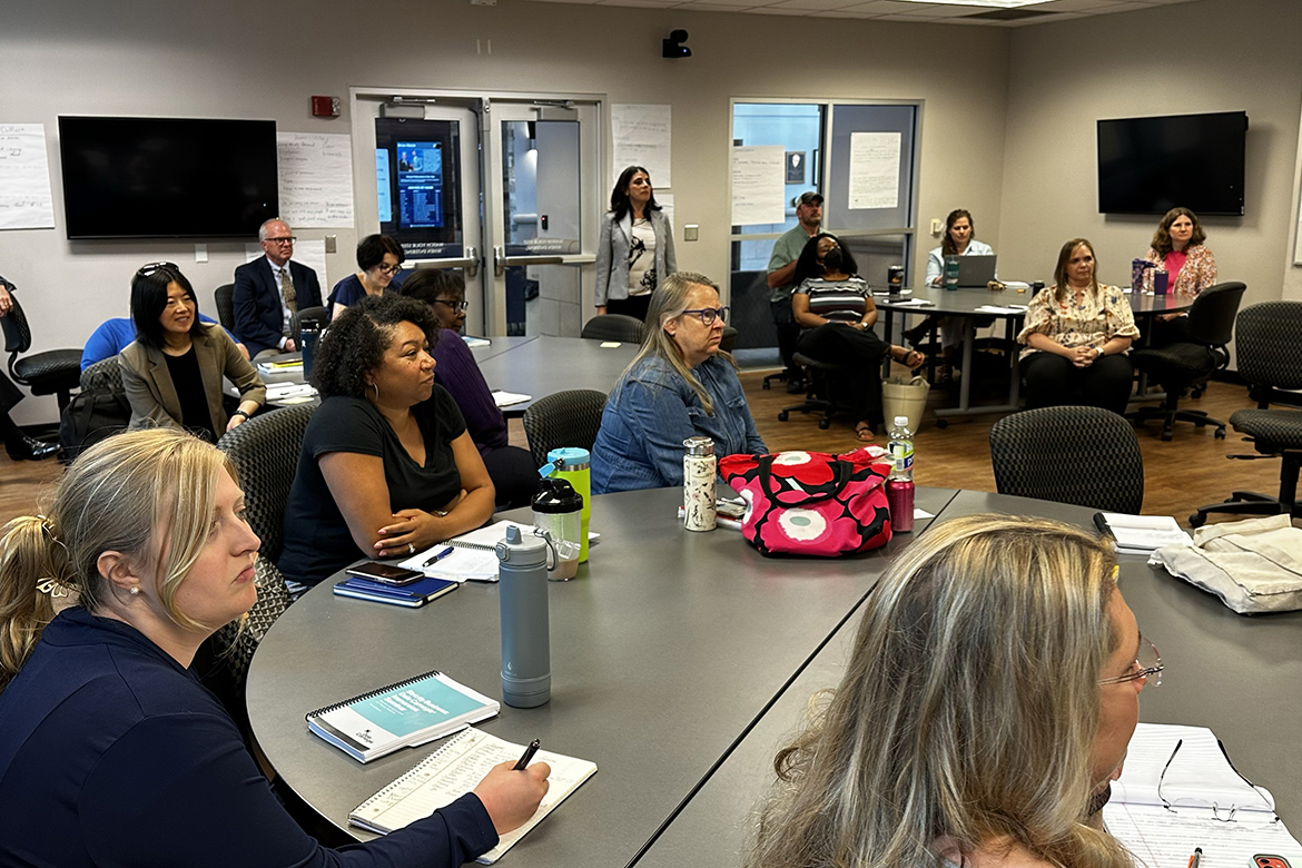 Twenty participants in the three-day Dale Carnegie summer immersion course held in early August for Middle Tennessee State University faculty and staff listen to instructions inside the Business and Aerospace Building on campus in Murfreesboro, Tenn. (MTSU photo by Darby Campbell-Firkus)