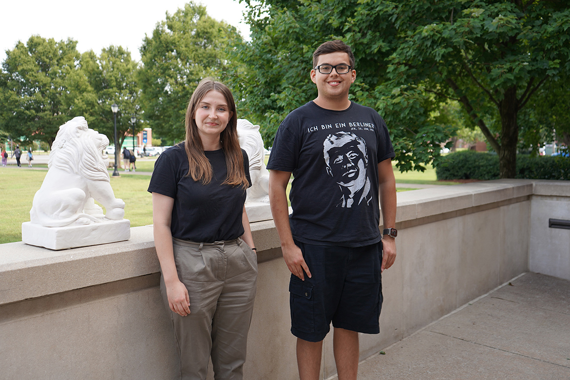 In this August 2025 photo, Middle Tennessee State University Honors students Victoria Grigsby, left, and Jorge Avila stand outside the Paul W. Martin Sr. Honors Building on campus in Murfreesboro, Tenn. Both are recipients of the prestigious 2025 Phi Kappa Phi Pioneer Award. (MTSU photo by Robin E. Lee)