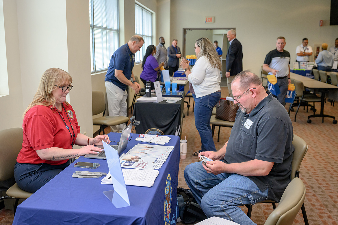 Veteran employees from Nashville International Airport check out educational and VA options available to them during a veterans’ benefits fair hosted by Middle Tennessee State University’s Charlie and Hazel Daniels Veterans and Military Family Center in mid-August in the Miller Education Center on Bell Street in Murfreesboro, Tenn. (MTSU photo by Andy Heidt)