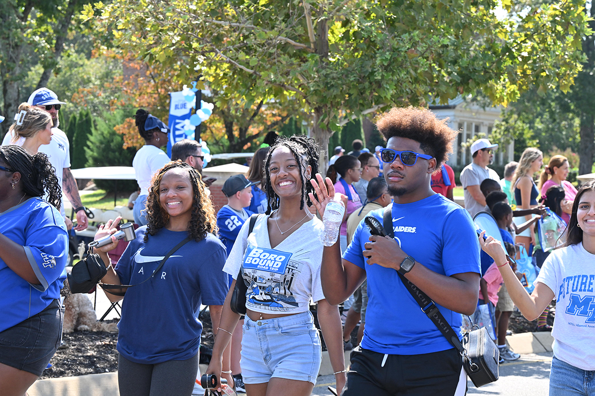 Middle Tennessee State University students enjoy walking in the 2025 Homecoming Parade, going down Middle Tennessee Boulevard in Murfreesboro, Tenn., on Saturday, Sept. 20. (MTSU photo by James Cessna)