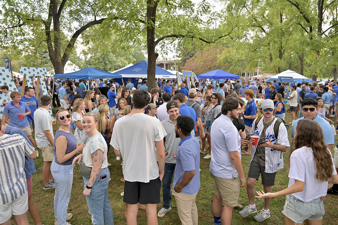Hundreds of Middle Tennessee State University students and others enjoy Party in the Grove and tailgating experiences in Walnut Grove on campus in Murfreesboro, Tenn., on Saturday, Sept. 20. (MTSU photo by J. Intintoli)