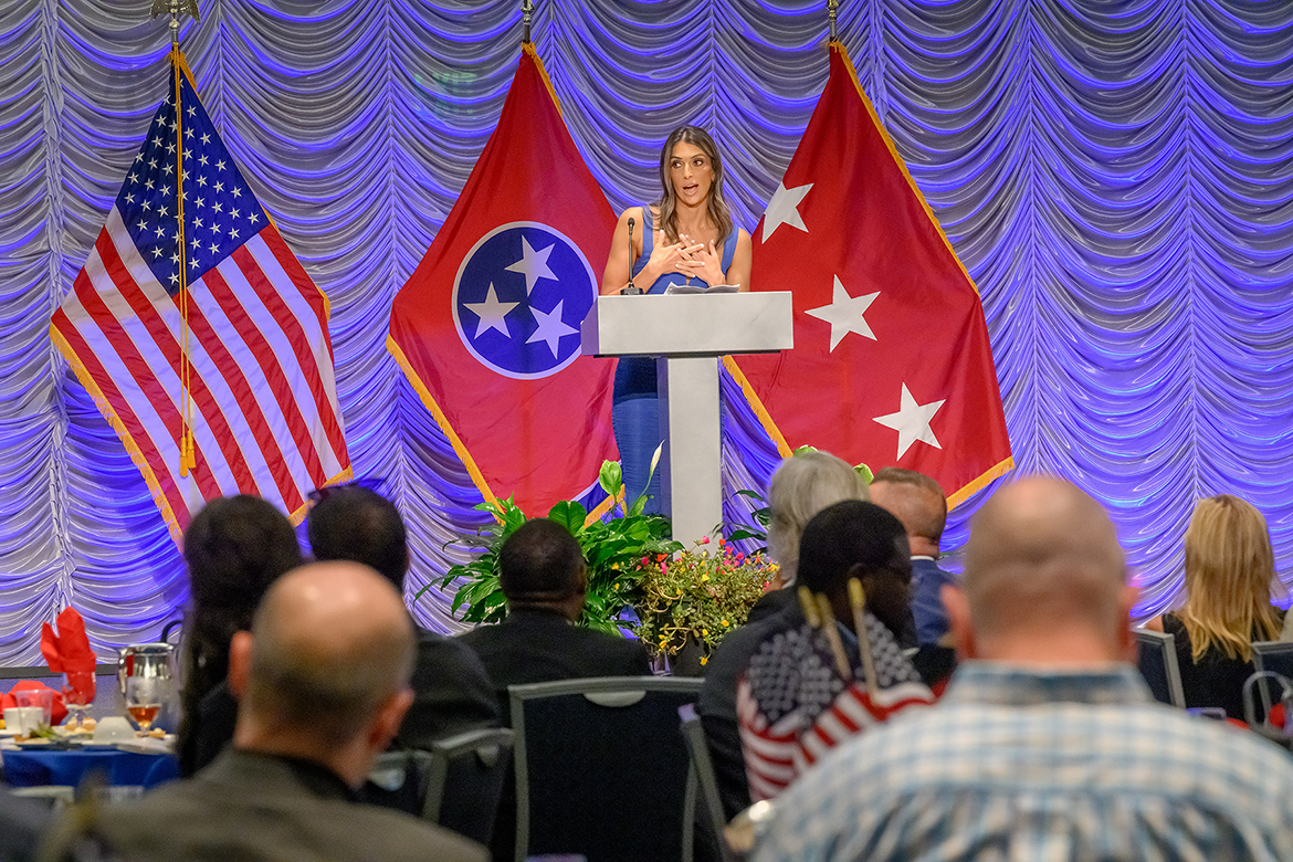 Maranda Vecchio shares her story — veteran, mother to two young children and graduate of the Middle Tennessee State University Physician Assistant Studies program — with the audience attending the eighth annual Veteran Impact Celebration in the Student Union Ballroom on campus in Murfreesboro, Tenn., in mid-August. (MTSU photo by J. Intintoli)