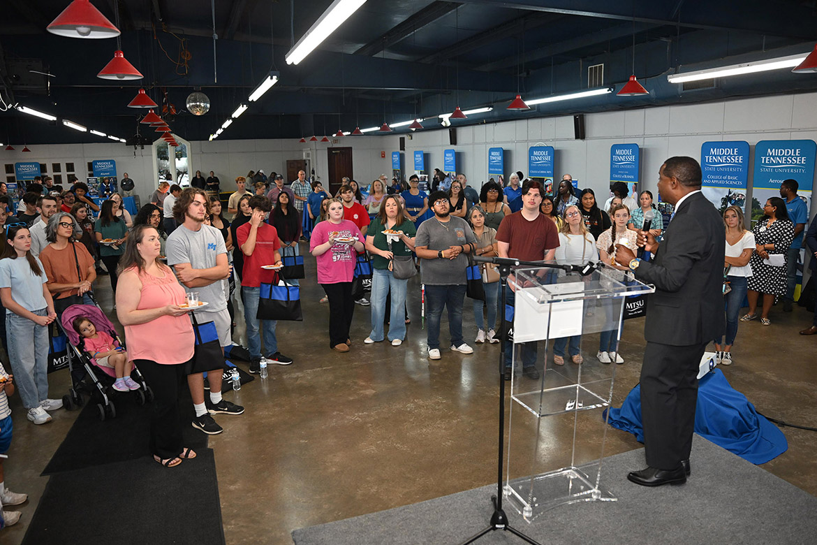 Middle Tennessee State University President Sidney A. McPhee talks to a packed house at the 2025 True Blue Tour kickoff student reception held Tuesday night, Sept. 16, at the Blue Ribbon Circle Club in Shelbyville, Tenn. McPhee gave out a total of $12,000 in scholarships to a record number of students — 28 in total — that evening. The Shelbyville stop is the first in a 15-stop student recruitment tour. (MTSU photo by James Cessna)