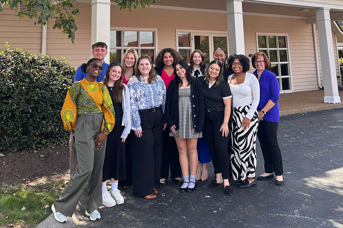Tricia Farwell, far right, associate professor in the School of Journalism and Strategic Media at Middle Tennessee State University in Murfreesboro, Tenn., takes a group photo with 11 of her MTSU students on Oct. 10, 2025, outside of Jarrard Inc., a Nashville-based strategic communications firm, where students spent the day participating in a mock crisis communications scenario that allowed them to apply classroom knowledge to real-world circumstances. (Photo submitted)