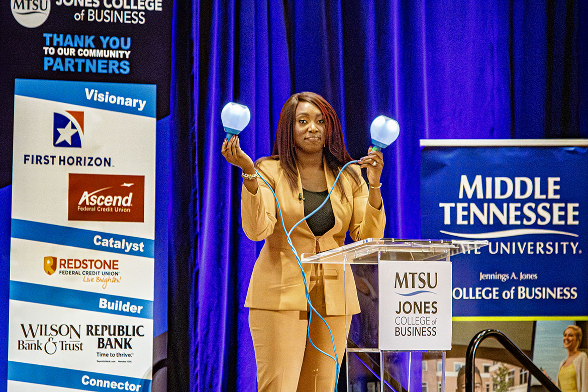 Inventor, CEO and entrepreneur Jessica O. Matthews demonstrates how the jump rope she helped invent can generate electricity during her keynote presentation about embracing artificial intelligence at Middle Tennessee State University’s 2025 Jones College of Business Leadership Summit held Sept. 26 at Embassy Suites in Murfreesboro, Tenn. (MTSU photo by Tom Beckwith)