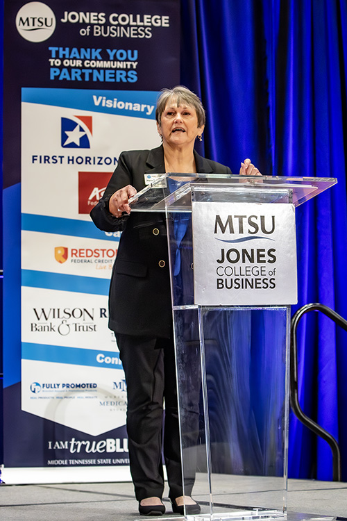 Joyce Heames, dean of the Jennings A. Jones College of Business at Middle Tennessee State University in Murfreesboro, Tenn., welcomes the hundreds of attendees to the 2025 Leadership Summit hosted by the college on Sept. 26 at Embassy Suites. (MTSU photo by Tom Beckwith)