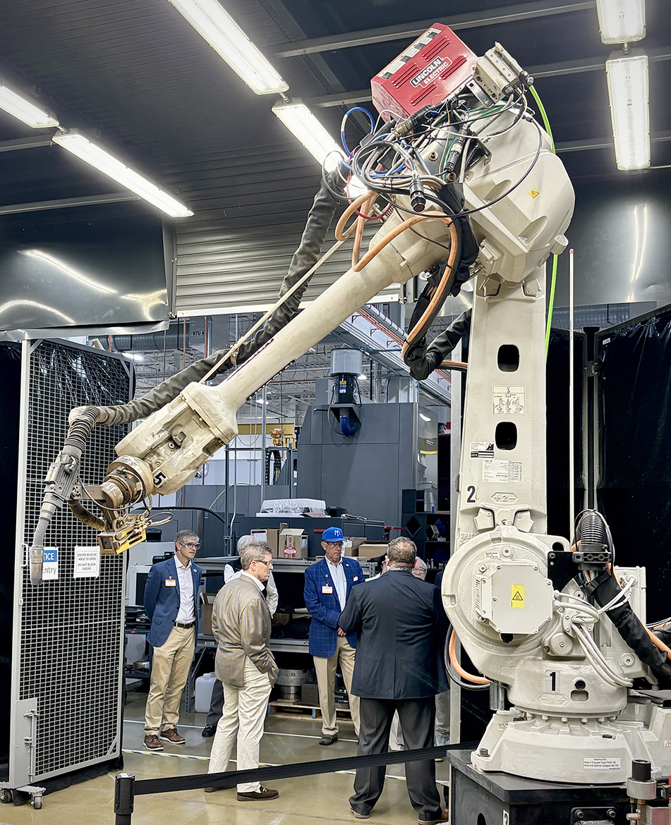 On a mission to explore quantum science and other science opportunities with its East Tennessee partner, Middle Tennessee State University administrators, faculty and Board of Trustees members gain a first-hand glimpse of massive size of Oak Ridge National Laboratory and its equipment this summer during of the Oak Ridge, Tenn., facility. (Oak Ridge National Laboratory photo)