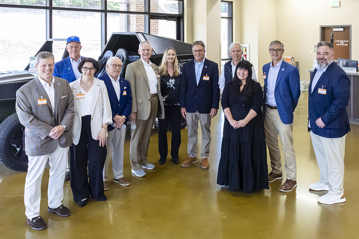 Taking a break while touring Oak Ridge National Laboratory in Oak Ridge, Tenn., Middle Tennessee State University administrators, faculty and Board of Trustees members to pose for a group photo while they wait for their next tour stop. ORNL and MTSU are strategic partners in quantum science and other science areas. From left, the group includes Trustee Pete DeLay, MTSU physics professor Hanna Terletska, Trustee Chair Steve Smith (behind Terletska), Trustees J.B. Baker and Tom Boyd, ORNL employee, MTSU Provost Mark Byrnes, former Congressman Bart Gordon, ORNL Communications Protocol Officer Maria Down, College of Basic and Applied Sciences Dean Greg Van Patten and David Butler, MTSU vice president for the College of Graduate Studies and vice provost for research. (Oak Ridge National Laboratory photo)