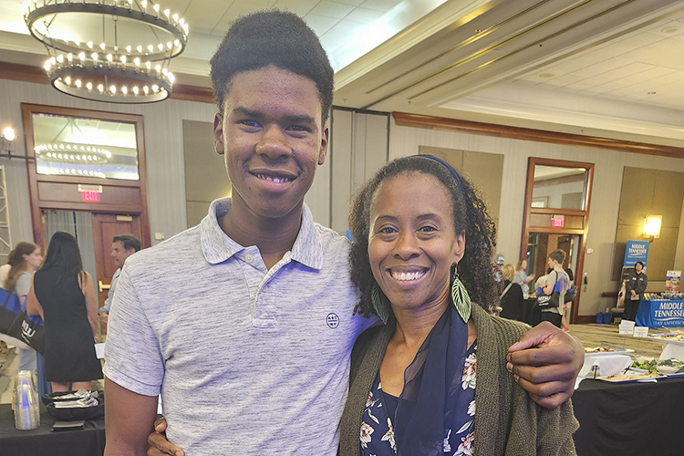 Chattanooga, Tenn., homeschooled high school senior Malachi Madison, left, and his mother, Erika, attend Middle Tennessee State University's True Blue Tour student recruitment stop held Sept. 25 at The Chattanoogan Hotel. (MTSU photo by Jimmy Hart)