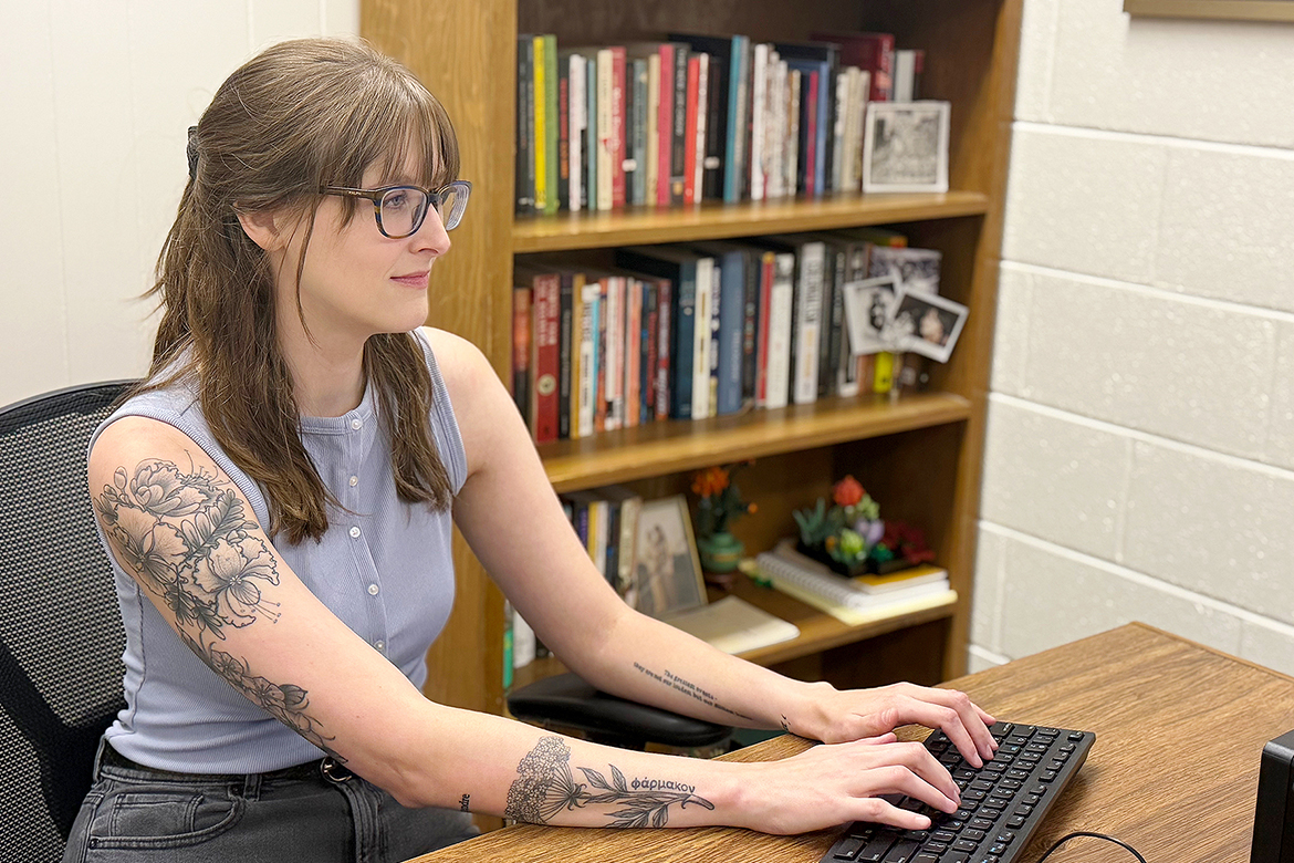 Kaity Newman, a lecturer in the Department of Philosophy and Religious Studies in the College of Liberal Arts at Middle Tennessee State University in Murfreesboro, Tenn., takes care of administrative responsibilities between classes. Newman is the second female philosophy professor in the university’s 114-year history and is also an MTSU alumna. (MTSU photo by Mike Davis)