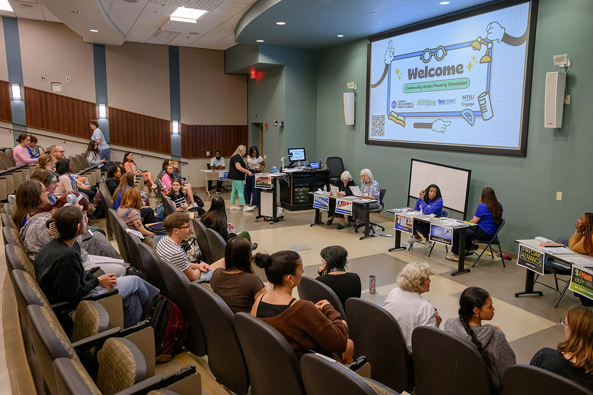 Middle Tennessee State University students and staff experience a first-hand look at realities low-i ncome families face during a recent poverty simulation held on campus in Murfreesboro, Tenn. Participants were each assigned a character and family situation to navigate through as they faced challenges such as unemployment, affordable childcare, transportation, housing crises and financial troubles. (MTSU photo by J. Intintoli)