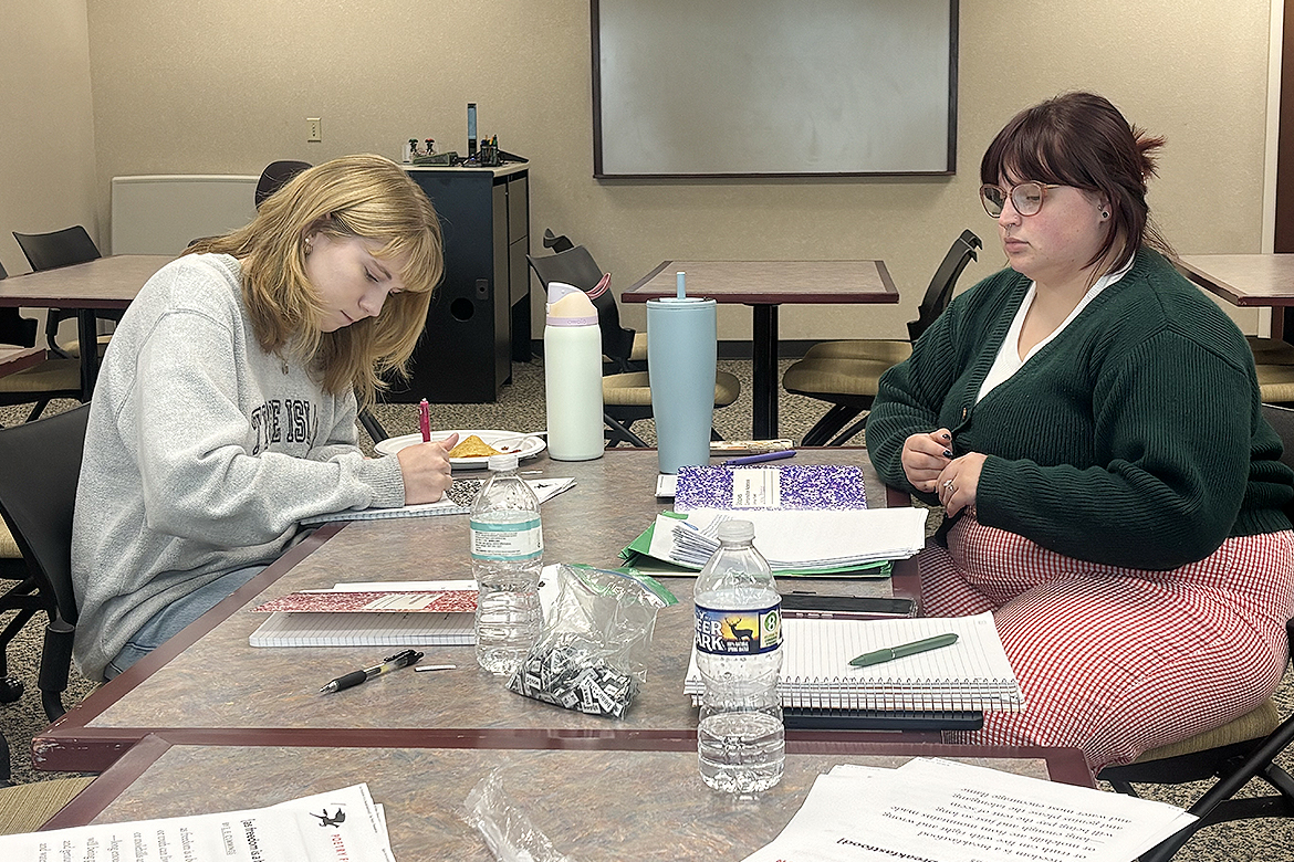 Middle Tennessee State University students Autumn McCleskey, left, and Chelsea Barranger work on a writing assignment during a “Tacos and Trauma” workshop at James E. Walker Library on campus in Murfreesboro, Tenn. The free weekly workshop sessions will be held at 1 p.m. each Friday through Nov. 20 and are meant to improve writing skills as well as help with mental wellness through the brain’s ability to change through positive, repetitive actions. (MTSU photo by Nancy DeGennaro)