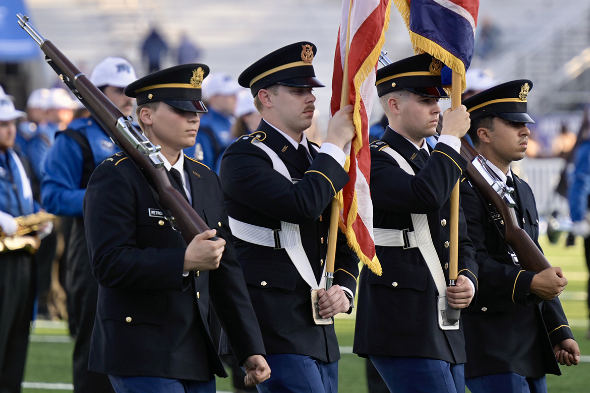 From left, Middle Tennessee State University ROTC cadets Simeon Petrounov, Tyler Knight, Shaun DeBien and Luis Benitez carry out their military color guard duties during the 43rd annual MTSU Salute to Veterans and Armed Forces game on Saturday, Nov. 8, in Floyd Stadium on campus in Murfreesboro, Tenn. (MTSU photo by Cat Curtis Murphy)